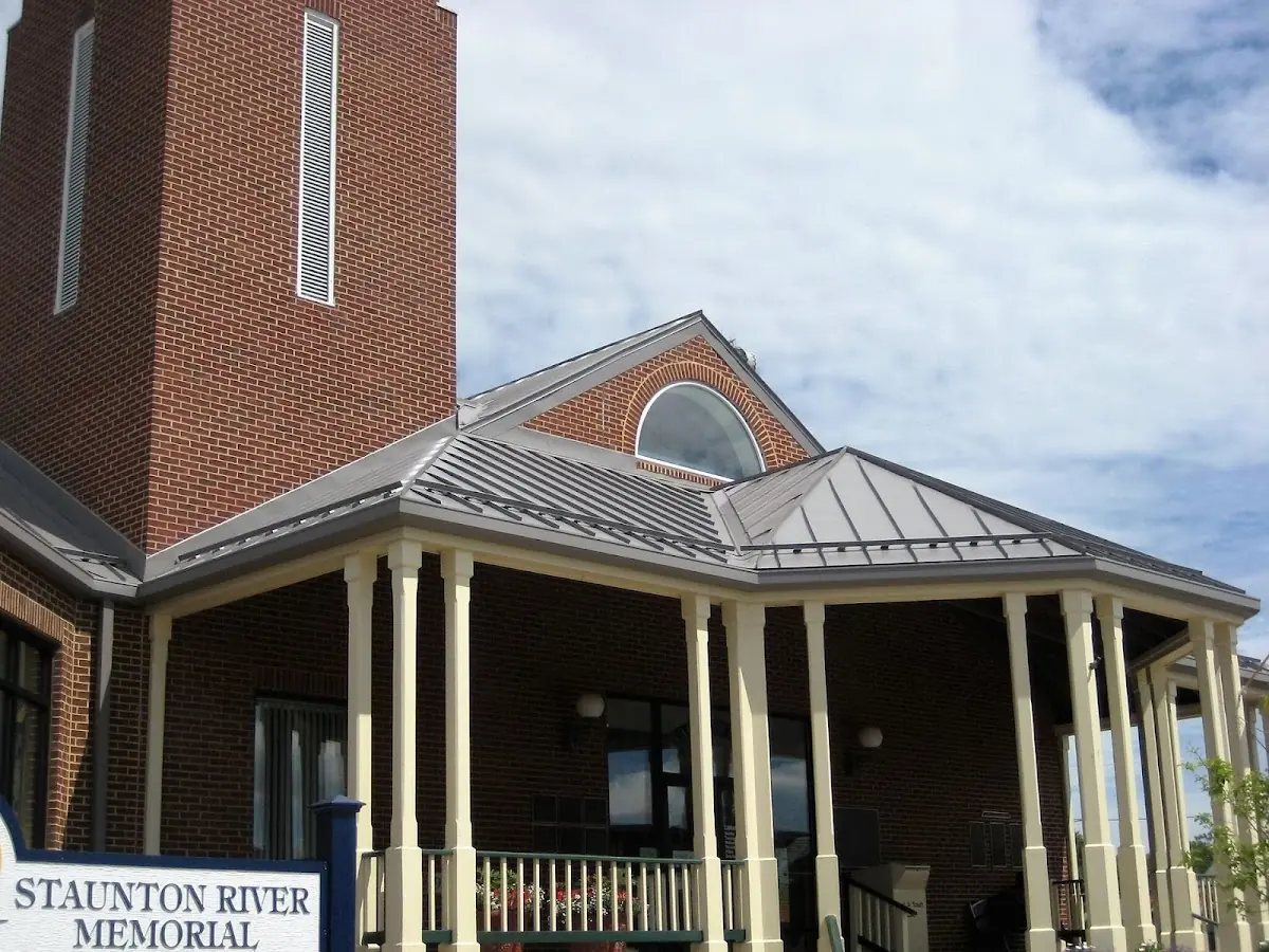 Skilled roofing craftsmen working on a residential roof in Englishtown